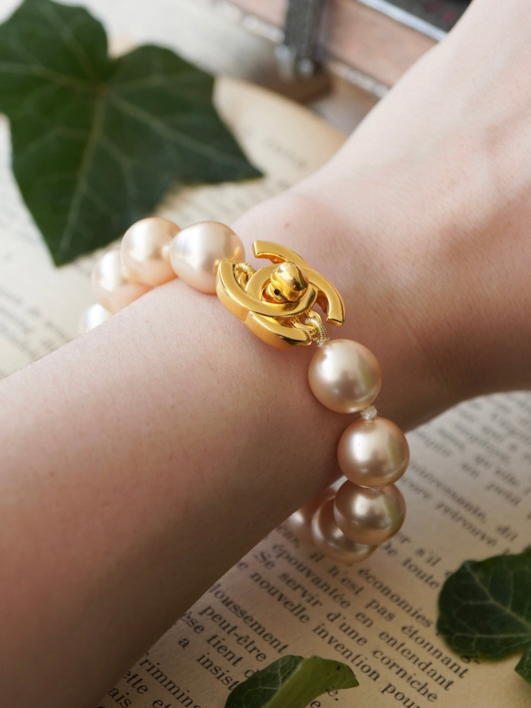 Vintage Chanel Turn-Lock Faux-Pearl Bracelet 1996 CC – Vintage