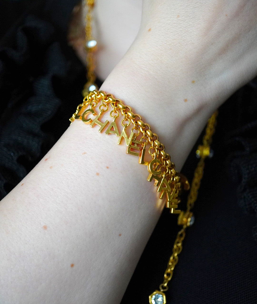 Vintage Chanel Bracelet with Chanel logo charms