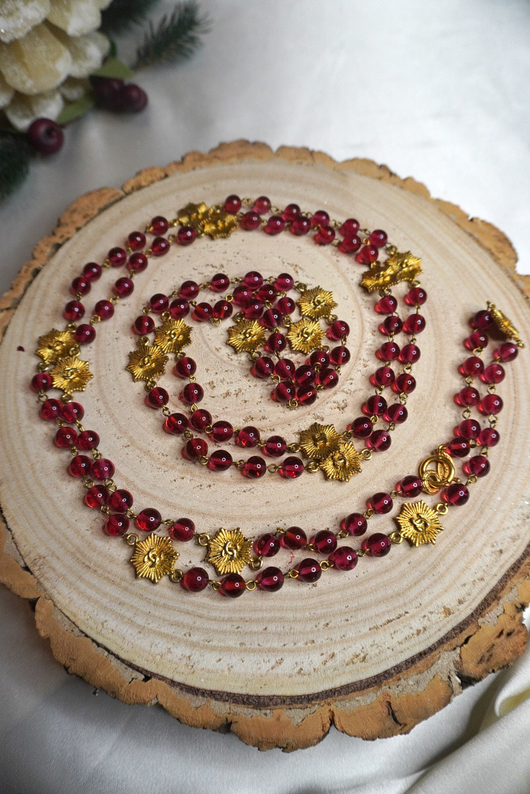 Vintage Chanel necklace with CC Logos and Red Glass Paste